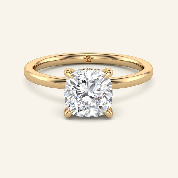 Aura Cushion Hidden Halo Solitaire Diamond Ring | 2 Carat in yellow gold with a cushion cut lab grown diamond and sleek band design.