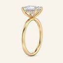 Side view of Aura Emerald Hidden Halo Solitaire Lab Grown Diamond Ring in yellow gold, showcasing hidden halo detail.