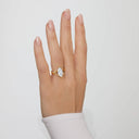 2 carat Esme Marquise Split Shank Diamond Ring worn on hand, showcasing its yellow gold setting and elongated marquise diamond cut.