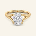 Esme Oval Split Shank Solitaire Diamond Ring in yellow gold with a 2 carat lab grown oval diamond and elegant split shank design.