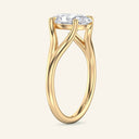 Side view of Esme Oval Split Shank Solitaire Diamond Ring in yellow gold, highlighting the curved split shank and raised oval diamond.