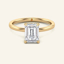 June Emerald Classic Solitaire Lab Grown Diamond Ring in yellow gold with a 2 carat emerald-cut diamond, featuring a sleek, timeless band.