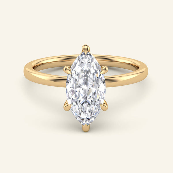 June Marquise Classic Solitaire Diamond Ring | 2 Carat in yellow gold with a marquise-cut lab grown diamond set in a six-prong setting.