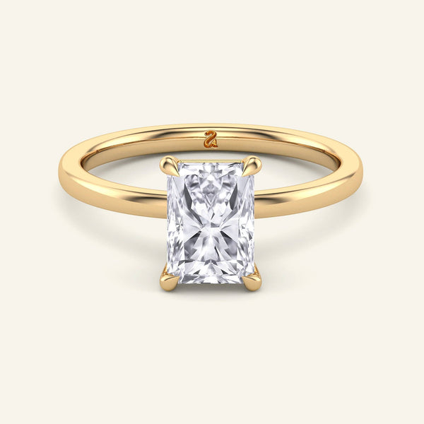 Radiant Cut Classic Solitaire Lab Diamond Ring in yellow gold with a weighty band and four-prong setting, ideal for modern brides.