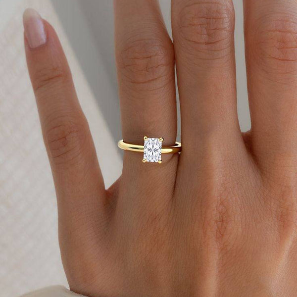 Radiant Cut Classic Solitaire Lab Diamond Ring worn on hand, showcasing its elegant brilliance and timeless yellow gold design.