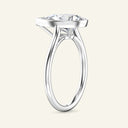 Side profile of Remi Pear Bezel Solitaire Diamond Ring in white gold, highlighting the raised 2 carat pear-shaped diamond in a clean bezel mount.