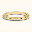 Cedar 2mm Lab Diamond Ring in yellow gold with micro-pavé diamonds in a shimmering eternity pattern. Elegant and nature-inspired wedding band.