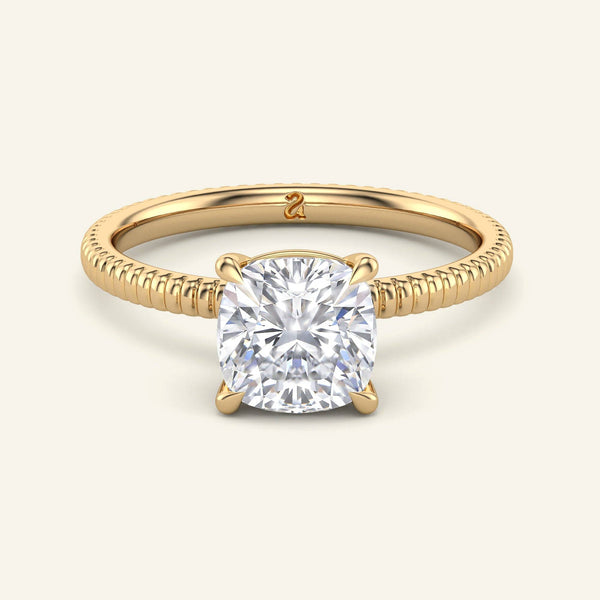 Bianca Cushion Ribbed Band Solitaire Diamond Ring in yellow gold with a 2 carat lab-grown cushion cut diamond and silk-inspired ribbed band.