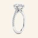 Side profile of Cora Oval Cathedral Pavé Solitaire Diamond Ring in white gold with elevated oval diamond and pavé band design.