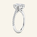 Side profile of Cora Pear Cathedral Pavé Solitaire Diamond Ring | 2 Carat in white gold, featuring elevated pear-cut diamond and pavé detailing.