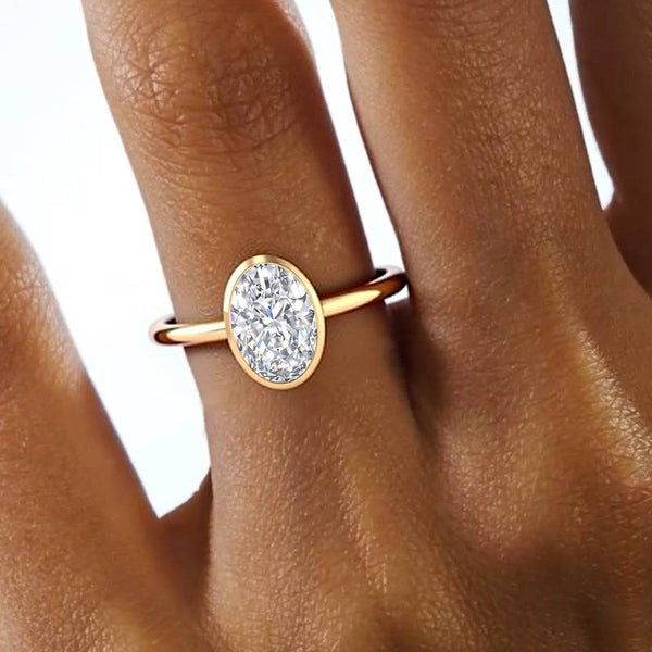 Remi Oval Bezel Solitaire Lab Grown Diamond Ring