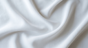 Soft white drapery folds in cool daylight — abstract editorial backdrop for is solid gold hypoallergenic
