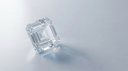 Asscher-cut lab-grown diamond engagement ring concept — square step-cut crystal with hall-of-mirrors facets on pale stone in soft daylight