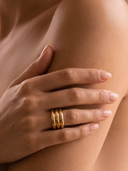 Model wearing the Sloane triple band solid gold ring