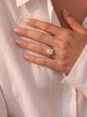 Model wearing the Terra cushion-cut lab-grown diamond bezel ring in solid gold