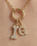 Alya Stone Letter and Best Friend Bone pavé diamond necklace set styled on a model