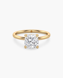 Aura cushion-cut lab-grown diamond hidden halo solitaire ring in solid gold, front view