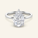 Pear cut lab grown diamond ring in white gold featuring a hidden halo solitaire design. Ideal for contemporary engagement styles.