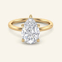 Pear cut lab grown diamond ring in yellow gold with hidden halo solitaire setting. Elegant engagement ring for modern brides.