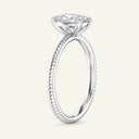 Profile view of Bianca Solitaire Diamond Ring in white gold highlighting the raised cushion cut diamond and ribbed band craftsmanship.