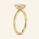 Side view of Bianca Solitaire Diamond Ring in yellow gold showcasing the elongated cushion cut diamond and ribbed band profile.