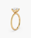 Bianca round brilliant lab-grown diamond solitaire ring, side view showing the ribbed band