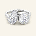Crest Round Pear Toi et Moi Lab Diamond Engagement Ring in white gold featuring 2 carat round and pear-shaped lab-grown diamonds in bezel and prong settings.