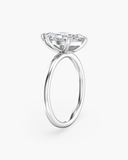 Side profile of June Marquise Classic Solitaire Diamond Ring | 2 Carat in white gold highlighting the raised diamond setting and slim band.