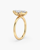 Side view of June Marquise Classic Solitaire Diamond Ring | 2 Carat in yellow gold showing elevated marquise diamond and sleek band profile.