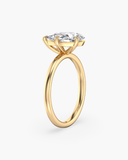 June tilted pear-cut lab-grown diamond classic solitaire ring, side view showing the angled pear