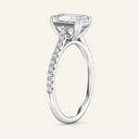 Side profile of Cora Emerald Cathedral Pavé Solitaire Diamond Ring in white gold, emphasizing the elevated cathedral setting and pavé diamonds.